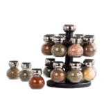 Olde Thompson Orbit 16-jar rotating chrome spice rack with sealed glass jars and clear printed caps.